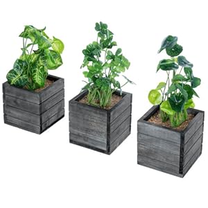 faux plants in grey wooden planter boxes