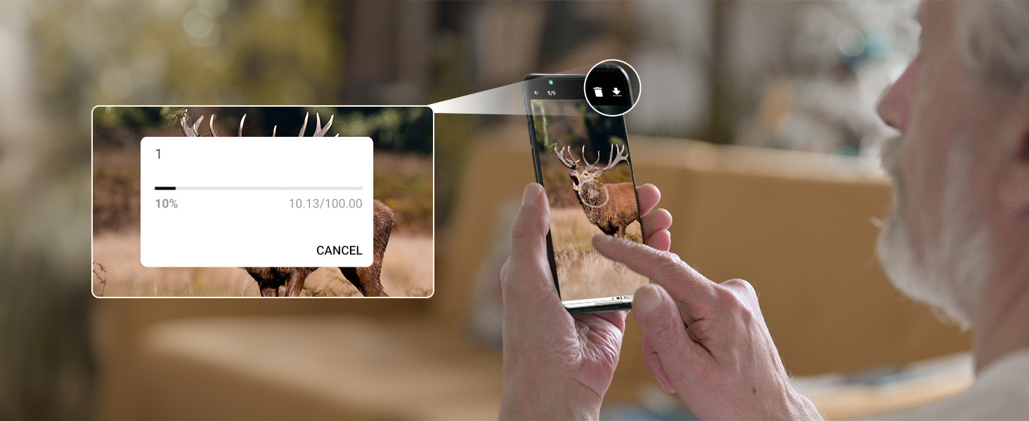 Hands holding a smartphone with a credit card scanner attached to the top. A blurred credit card reader interface is visible on the phone's screen.
