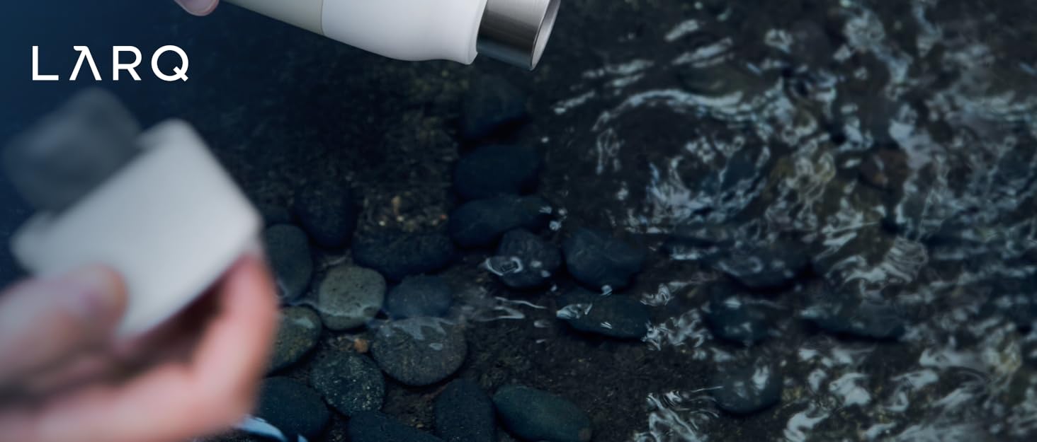 Person filling a LARQ Bottle PureVis from a freshwater river