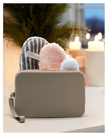 Lifestyle image of various waschies pads coming out of a zero waste travel bag