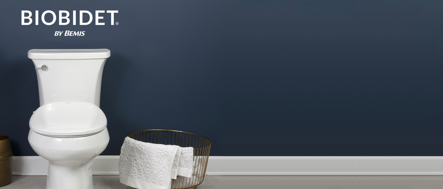 Bio Bidet by Bemis bathroom with dark blue walls and a white low profile bidet seat with warm water