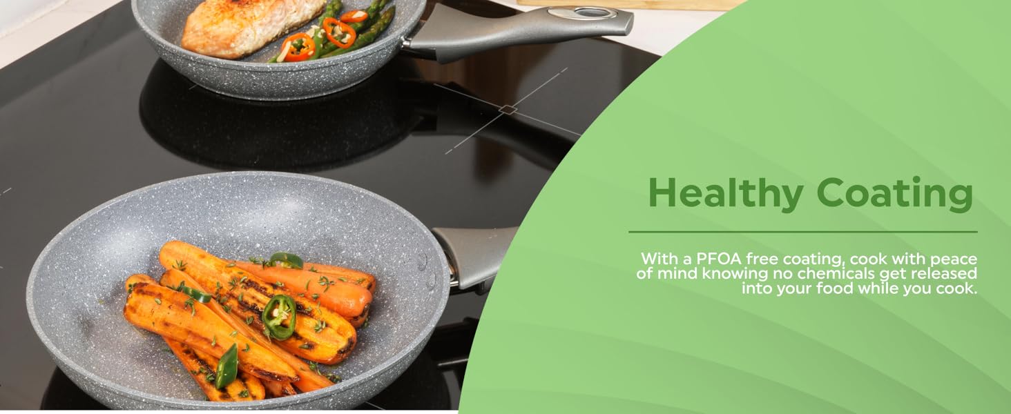 Two pans on a stove with sizzling vegetables and meat. A delicious and colorful meal being prepared.