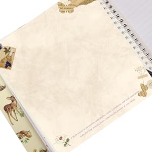 Inside pages arranged for documenting pregnancy, birth, and early years scrapbook 