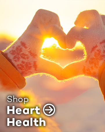 Hands forming heart shape against sunset sky, with text 'Shop Heart Health' overlaid at bottom.
