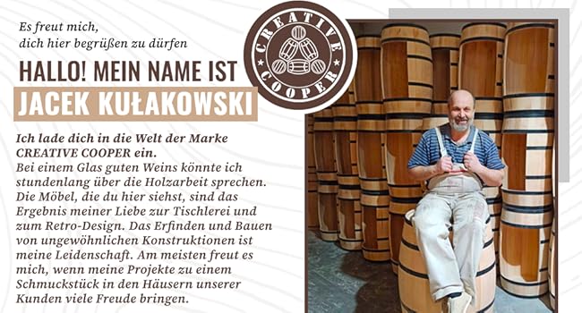 a man sitting on a barrel of wine.