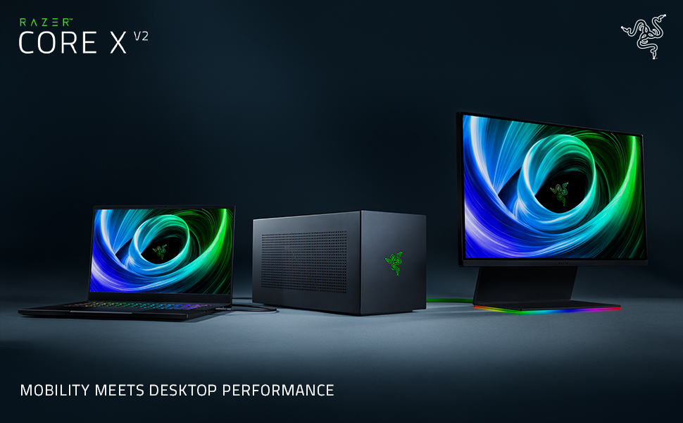 El texto dice: «CORE X», «LA MOVILIDAD SE COMBINA CON EL RENDIMIENTO DEL ESCRITORIO» Configuración para juegos con portátiles Razer que muestran gráficos en espiral azul-verde y una unidad central negra.