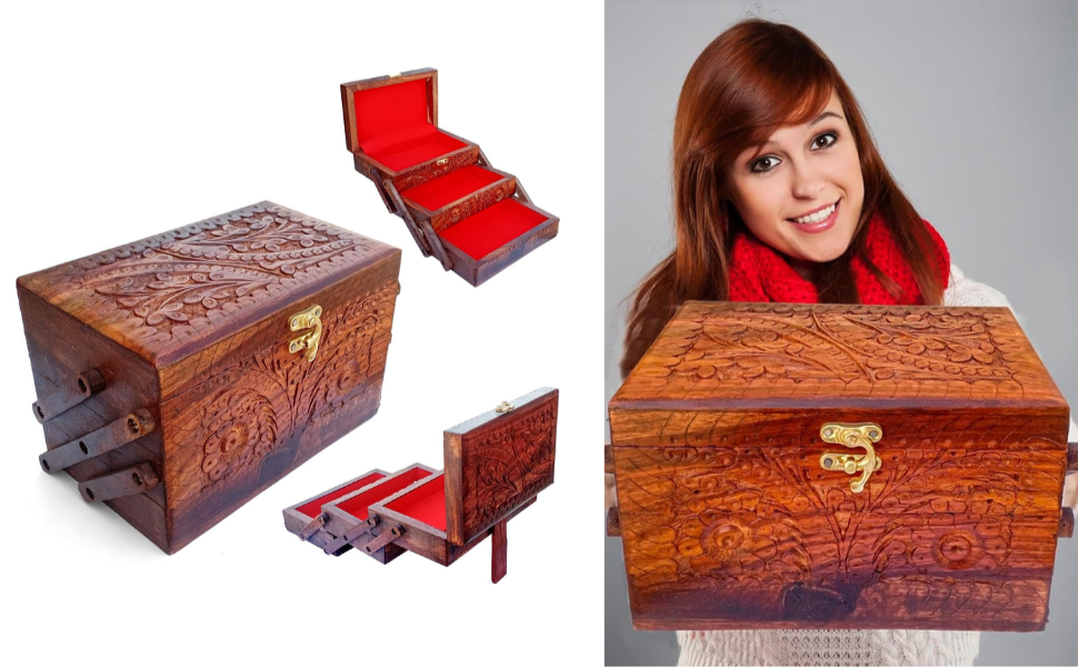 A women holding antique jewelry box