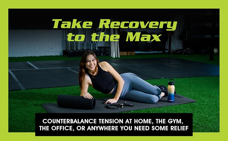 person using foam roller with grooves on their arms and back on a wall