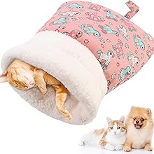 Sleeping bag on floor next to couch