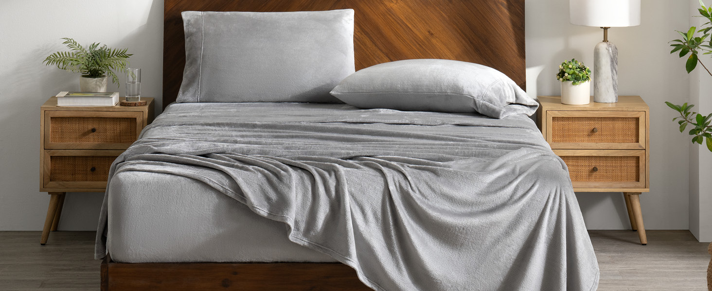 bedroom scene, with microplush sheets on bed