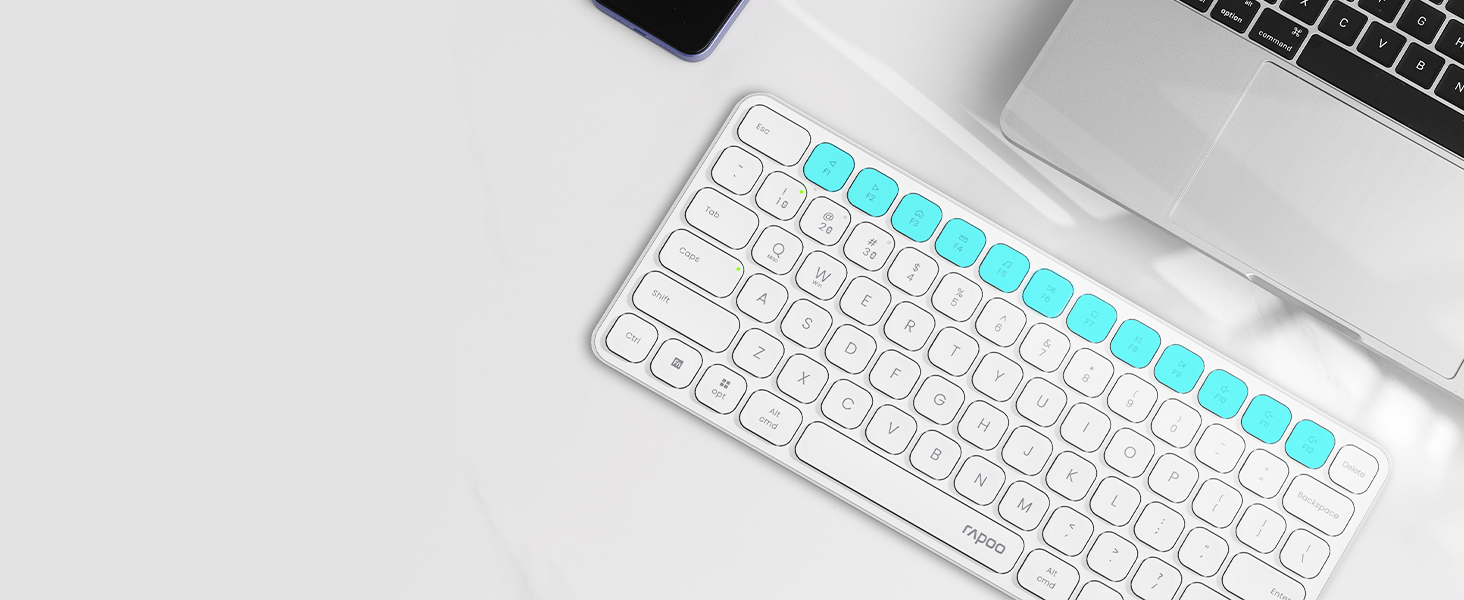 Collection of images showing close-up detail of a keyboard with illuminated turquoise backlighting against white and dark backgrounds.