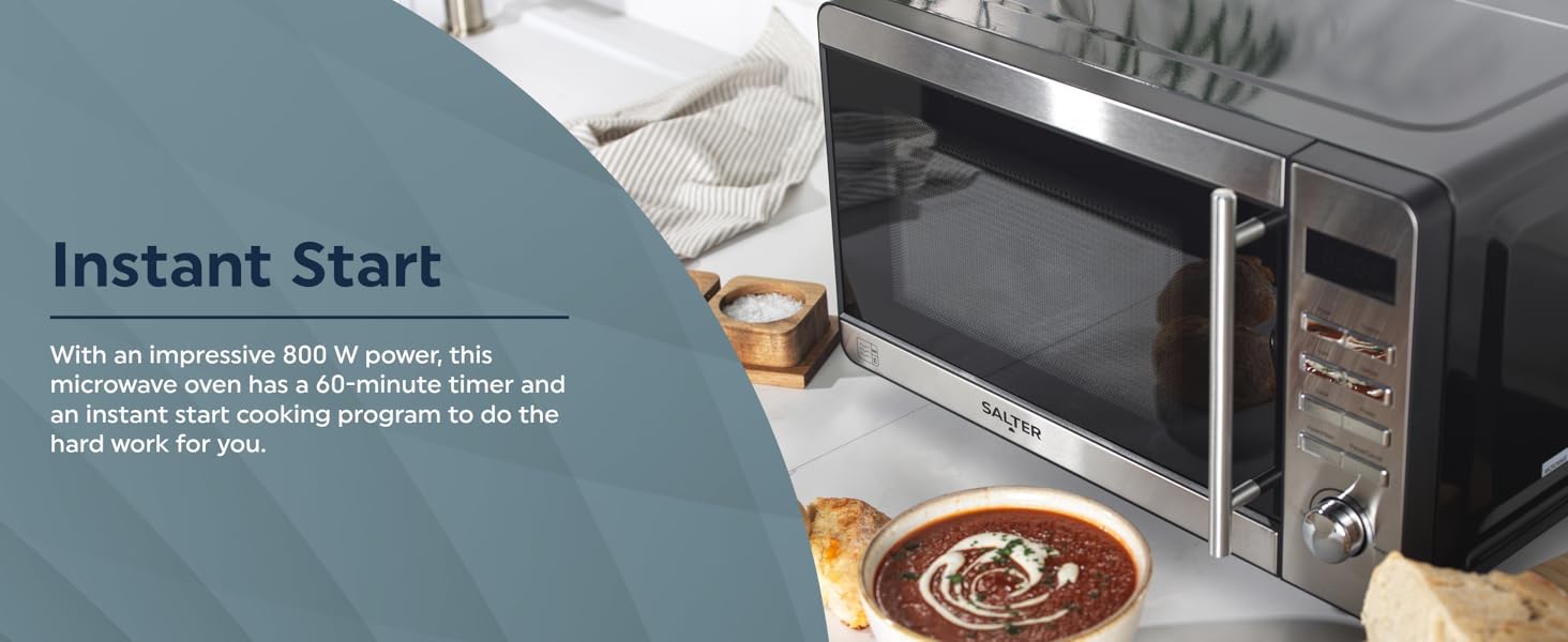 A person opening a microwave with a bowl of soup on the kitchen countertop