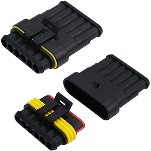 Black plastic electrical connectors with multiple pins. Three variants shown: sealed, open, and with yellow and red wire connections visible.