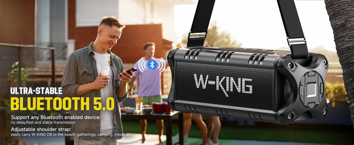 W-King portable Bluetooth 5.0 speaker with rugged black exterior, carrying strap, and protective side bumpers.