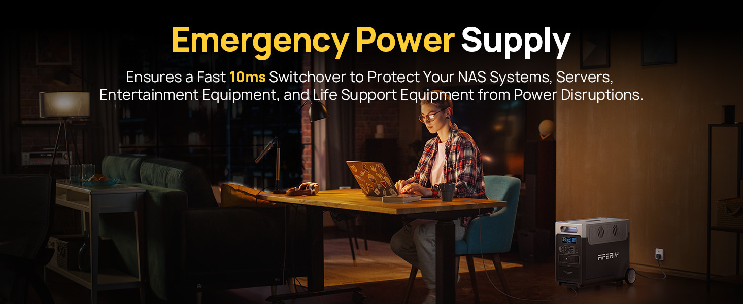 a woman sitting at a table with a laptop and a firefighter on her lap.