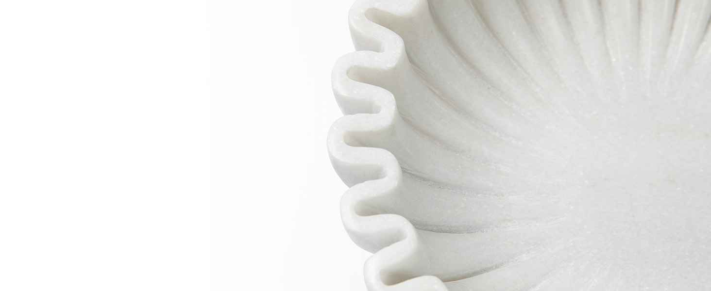 closeup on unique design of marble ruffle bowl