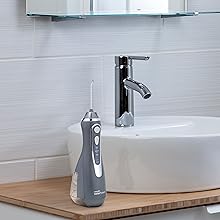 WP-587 Cordless Advanced Water Flosser in bathroom