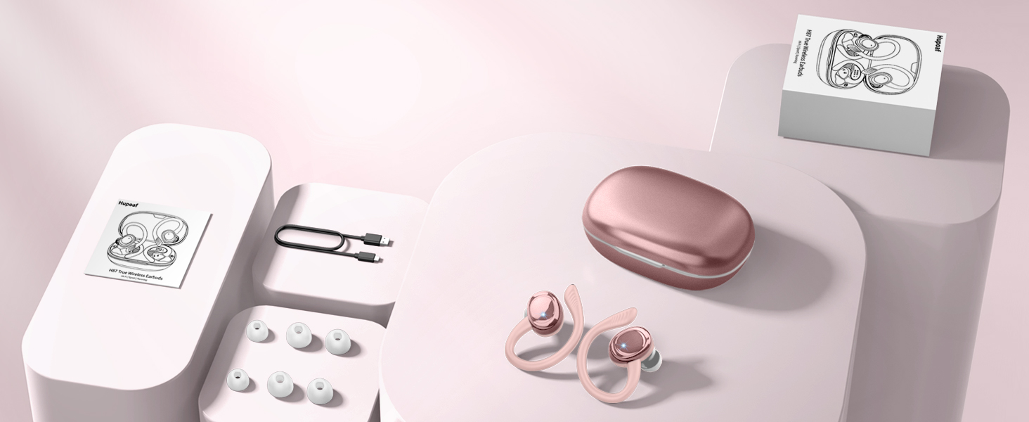 Rose gold wireless earbuds with charging case, displayed alongside packaging and accessories on a pink background.