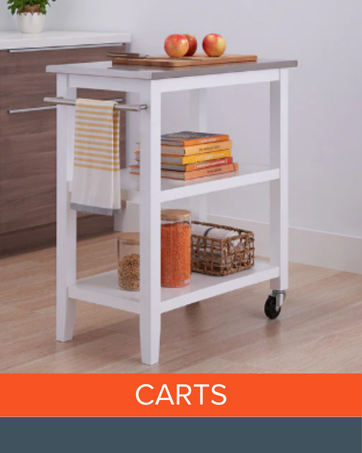 White kitchen cart with shelves, books, jars, apples, and towel bar on wood floor.