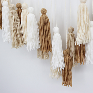 made of 100% natural  cotton thread and wood beads