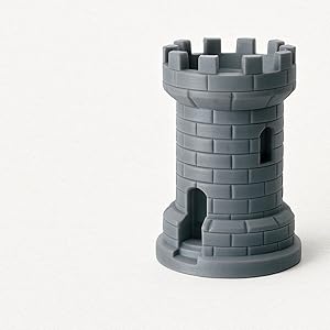 Gray 3D-printed castle tower model on a light textured background