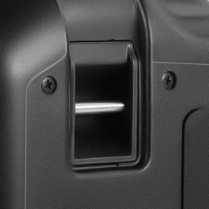 Close-up of a rectangular device with a small opening or slot, possibly for fingerprint scanning or card insertion.