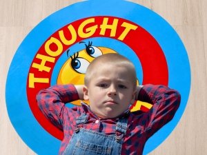 Toddler lying on mat