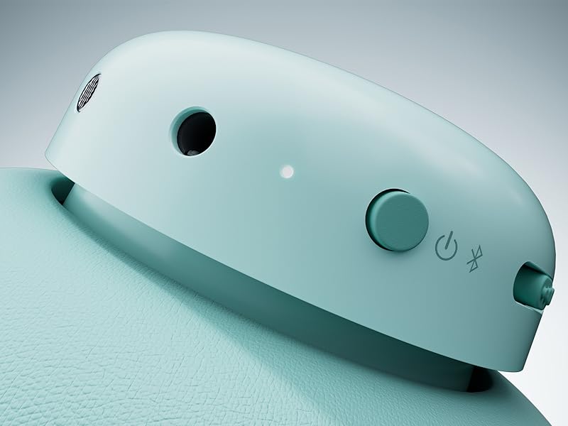 Dispositivo electrónico minimalista de color blanco con diseño curvo, con un botón de encendido y aberturas circulares a cada lado. El dispositivo se muestra sobre un fondo azul claro.