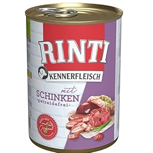 Zylindrische Metalldose mit Tiernahrung der Marke „RINTI“ mit rotem Etikett, das den fleischbasierten Inhalt anzeigt.