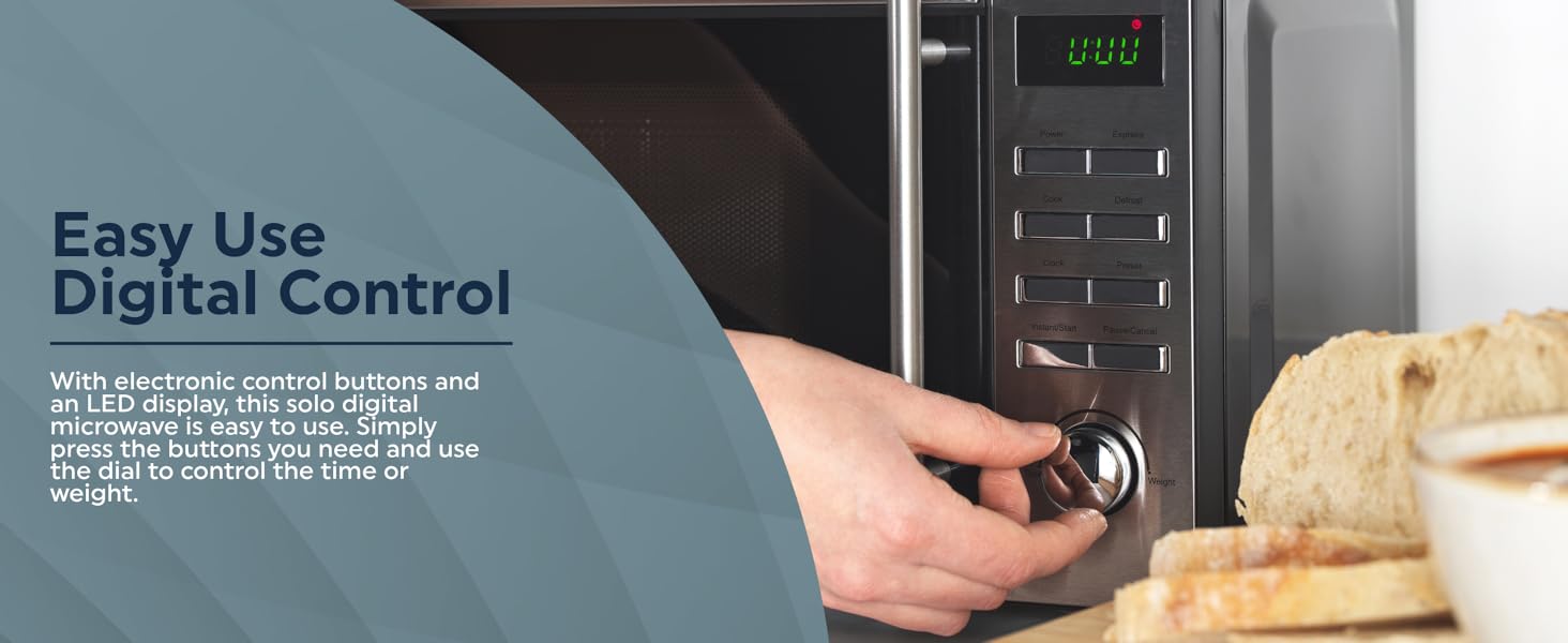 Person using the control dial on a  microwave