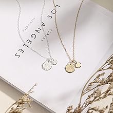 stamped rainbow charm with small paw charm sterling silver and 14k gold vermeil necklaces