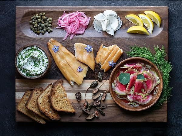 Reversible, smart design perfect with organizing compartment for meal prep and charcuterie. 