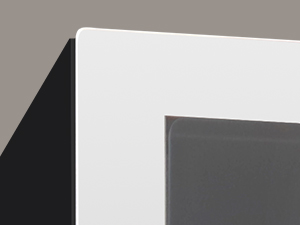 Closeup of top corner of the seamless stainless steel door frame with hidden hinge