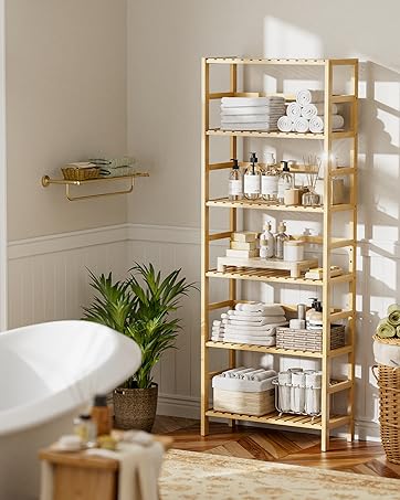 Bright interior space featuring wooden shelving units against white walls with large windows. Natural light illuminates organized storage display with baskets and decorative items.
