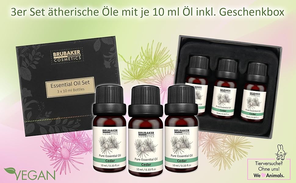 3 Flaschen ätherisches Öl mit Zeder in einer eleganten schwarzen Geschenkverpackung