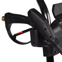 Close-up of a black plastic device with a trigger-like handle, possibly part of a power tool or sprayer.