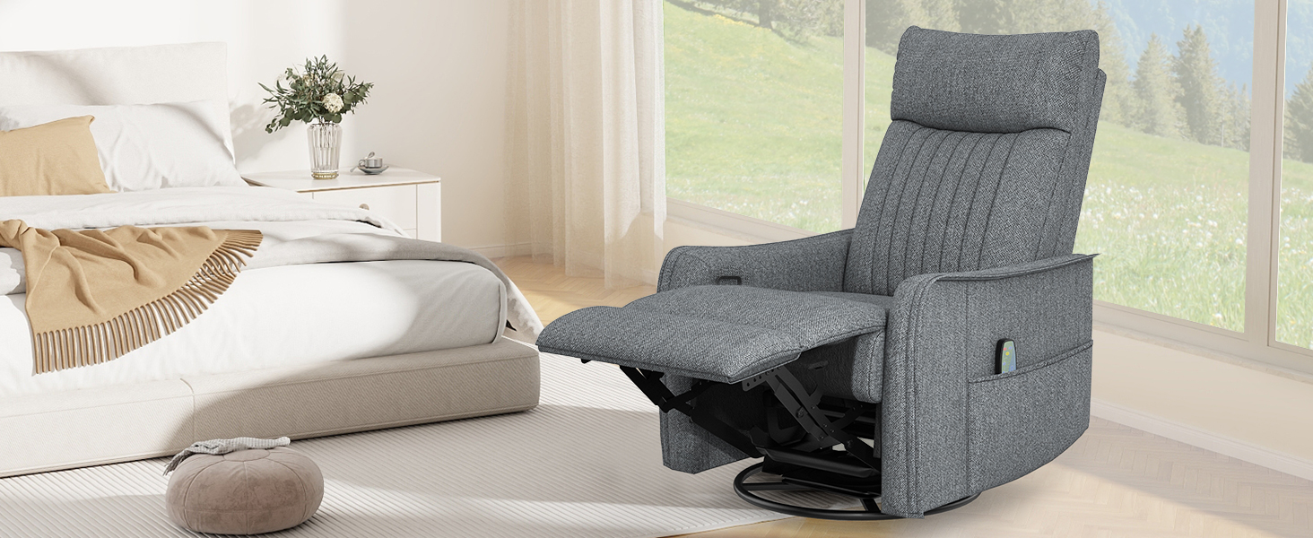 ein Sessel mit grauem Stoff und einem weißen Bett in einem Raum