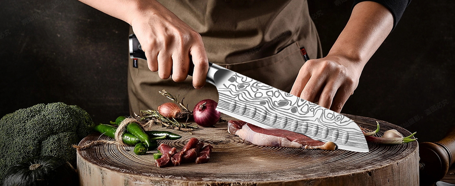 A pair of hands shown working with what appears to be culinary tools or equipment against a dark background.