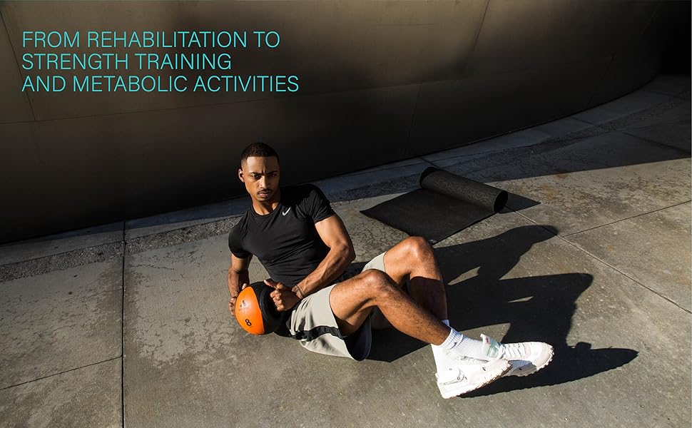 man working out with dual grip ball
