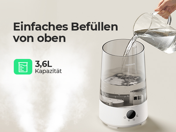 White cylindrical humidifier with 3.6L capacity being filled from above with water from a glass pitcher, highlighting easy top-filling feature.