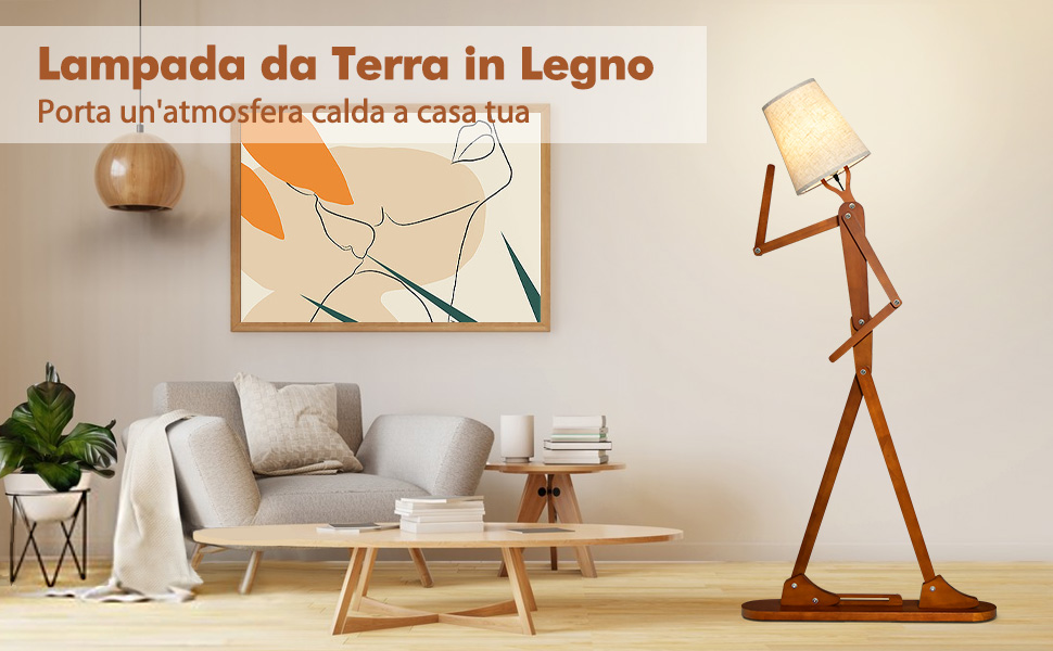 Lampada da terra con figure stilizzate in legno con paralume in tessuto, situata in un soggiorno moderno con divano, tavolino da caffè e arte murale astratta.