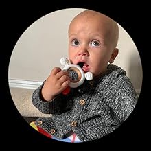 Lightweight silicone baby teether for easy handling and teething relief.