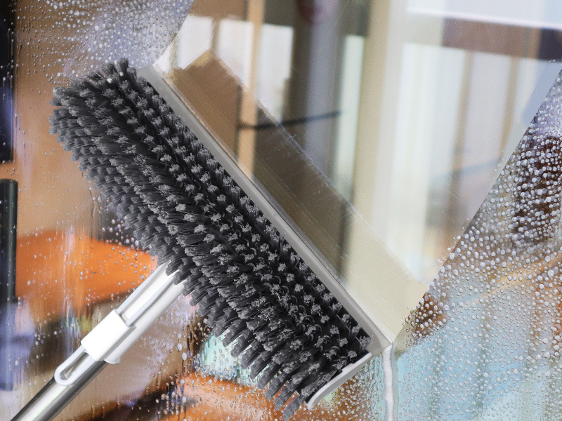 Floor brush with scraper