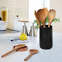 Minimalist wooden kitchen utensil set with ceramic holder