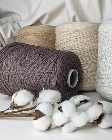Text reads 'Image 4'. Raw cotton bolls alongside spools of brown and beige thread or yarn on light fabric background.