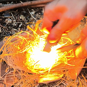 Forcefully strike the ferro rod several times