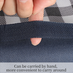 a woman's hand is shown holding a bag with a zipper.