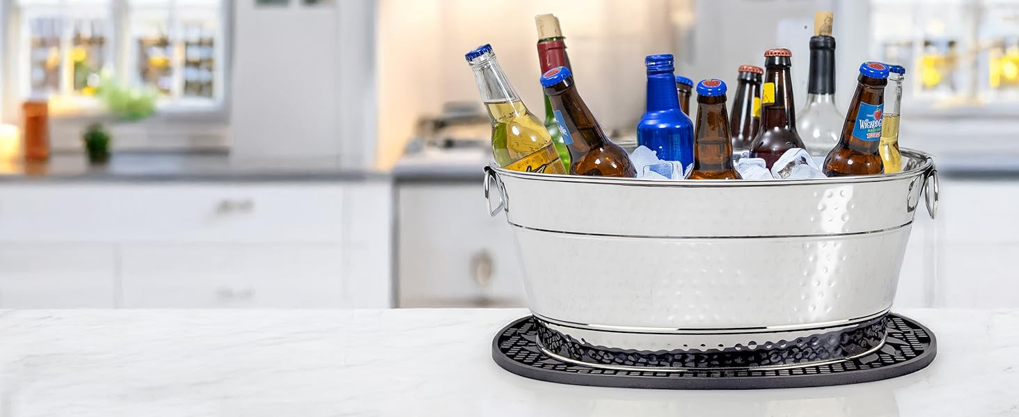 BREKX ice buckets for parties to chill drinks.  This bucket is paired with a bar mat.