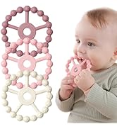Teething toy set with three circular rings in pink, light pink, and cream. Each ring has textured beads. A baby is shown chewing on one of the rings.