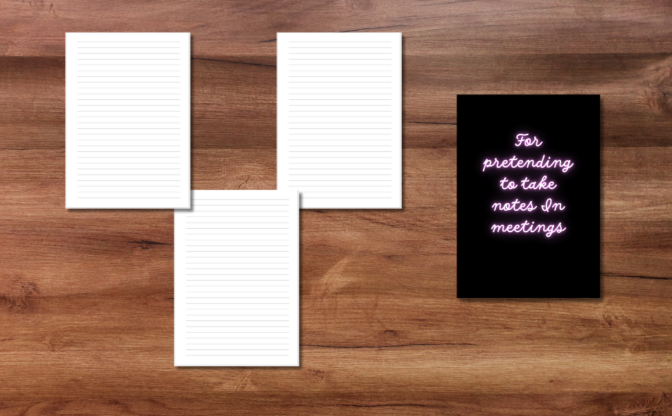 black and neon coloured notebook on the right and its interior pages on the left